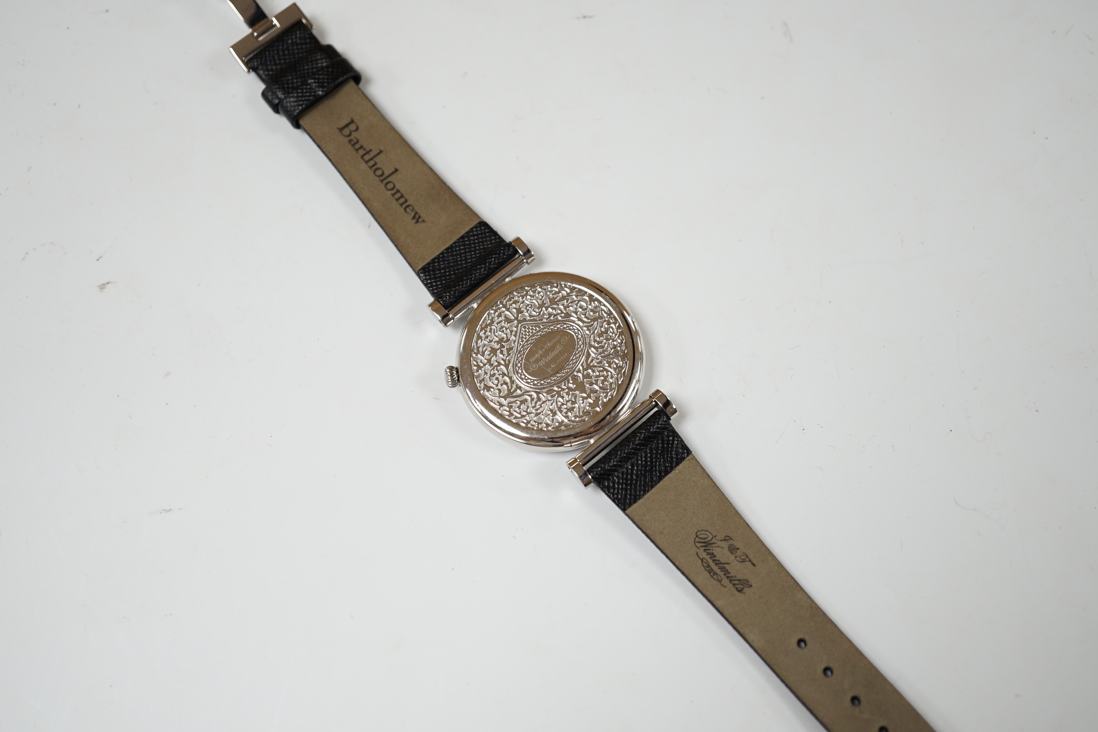 A gentleman's 2006 Joseph & Thomas Windmills Bartholomew First Edition white metal (stamped 950 for platinum) manual wind wrist watch, numbered 00144/00150, on leather strap with stainless steel deployment clasp, with or